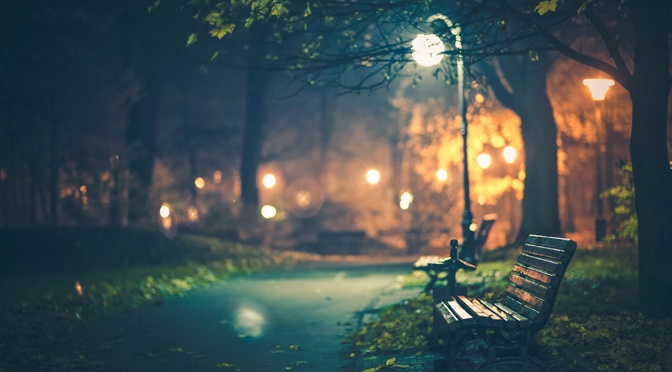 A Night in the Park. Late Autumn Night in the Park. Wood Benches and Park Alley. Horizontal Photography. Central Europe